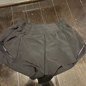 Lululemon black hotty hot shorts 2.5’ inseam. Size 4